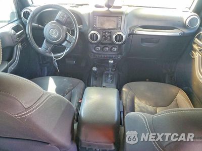 Zdjęcie 8 z 13 samochodu: 2015 JEEP WRANGLER UNLIMITED SAHARA VIN:1C4HJWEG9FL524568 - miniatura