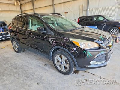 Czwarte zdjęcie samochodu z boku: 2016 FORD ESCAPE SE VIN:1FMCU9GX3GUC13838 - miniatura