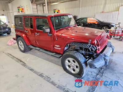 Czwarte zdjęcie samochodu z boku: 2013 JEEP WRANGLER UNLIMITED SAHARA VIN:1C4BJWEG1DL597260 - miniatura