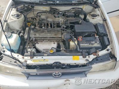 Zdjęcie 11 z 12 samochodu: 1995 TOYOTA COROLLA DX VIN:1NXAE09B7SZ305917 - miniatura