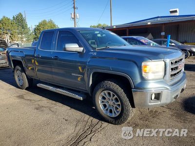 Czwarte zdjęcie samochodu z boku: 2014 GMC SIERRA K1500 SLE VIN:1GTV2UEC6EZ180307 - miniatura