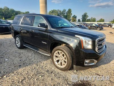 Czwarte zdjęcie samochodu z boku: 2019 GMC YUKON SLT VIN:1GKS2BKC6KR339015 - miniatura