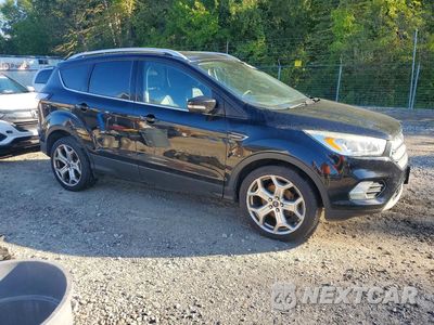 Czwarte zdjęcie samochodu z boku: 2017 FORD ESCAPE TITANIUM VIN:1FMCU0JD3HUA59367 - miniatura