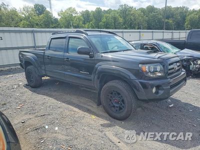Czwarte zdjęcie samochodu z boku: 2010 TOYOTA TACOMA DOUBLE CAB LONG BED VIN:3TMMU4FNXAM021629 - miniatura