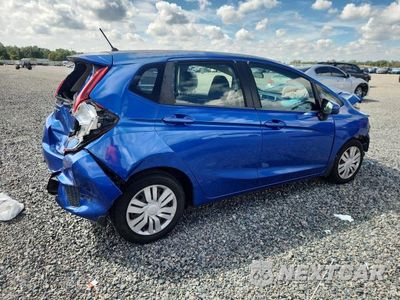 Trzecie zdjęcie samochodu z tyłu: 2016 HONDA FIT LX VIN:JHMGK5H53GS011786 - miniatura