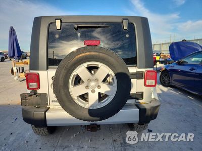 Zdjęcie 6 z 13 samochodu: 2008 JEEP WRANGLER UNLIMITED SAHARA VIN:1J4GA59138L505507 - miniatura