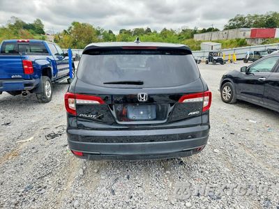 Zdjęcie 6 z 14 samochodu: 2021 HONDA PILOT LX VIN:5FNYF6H11MB012778 - miniatura