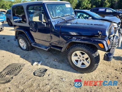 Czwarte zdjęcie samochodu z boku: 1997 JEEP WRANGLER / TJ SPORT VIN:1J4FY19SXVP489075 - miniatura