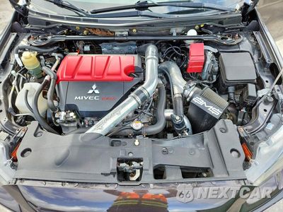 Zdjęcie 11 z 12 samochodu: 2014 MITSUBISHI LANCER EVOLUTION GSR VIN:JA32W8FV7EU005901 - miniatura