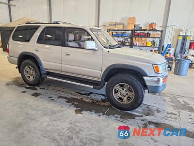 Czwarte zdjęcie samochodu z boku: 1997 TOYOTA 4RUNNER SR5 VIN:JT3HN86R6V0130871 - miniatura