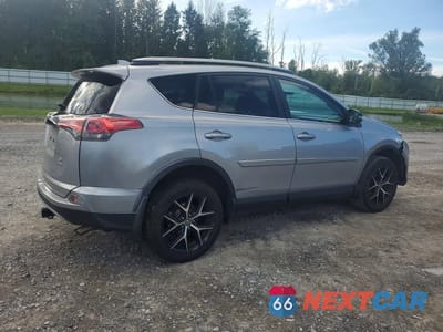 Trzecie zdjęcie samochodu z tyłu: 2017 TOYOTA RAV4 SE VIN:2T3JFREV0HW671963 - miniatura