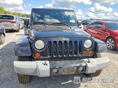 Piąte zdjęcie samochodu w środku: 2012 JEEP WRANGLER UNLIMITED SAHARA VIN:1C4BJWEG1CL279766 - miniatura