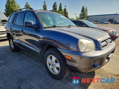 Czwarte zdjęcie samochodu z boku: 2005 HYUNDAI SANTA FE GLS VIN:KM8SC13D05U874557 - miniatura
