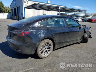 Trzecie zdjęcie samochodu z tyłu: 2023 TESLA MODEL 3 VIN:5YJ3E1EA8PF608575 - miniatura