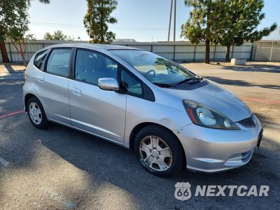 Czwarte zdjęcie samochodu z boku: 2012 HONDA FIT VIN:JHMGE8H35CS000855 - miniatura