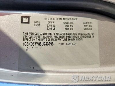 Zdjęcie 12 z 12 samochodu: 2006 CADILLAC DTS VIN:1G6KD57Y06U243298 - miniatura