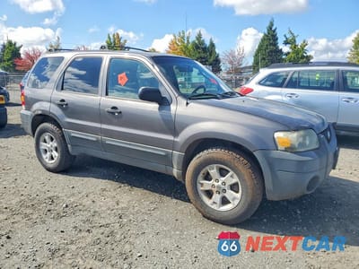 Czwarte zdjęcie samochodu z boku: 2006 FORD ESCAPE XLT VIN:1FMYU93196KA28582 - miniatura
