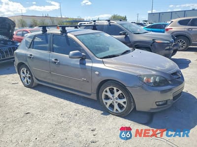 Czwarte zdjęcie samochodu z boku: 2007 MAZDA 3 HATCHBACK VIN:JM1BK344471765735 - miniatura