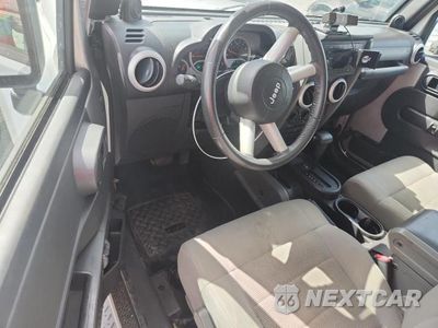 Zdjęcie 8 z 12 samochodu: 2009 JEEP WRANGLER SAHARA VIN:1J4FA541X9L703750 - miniatura