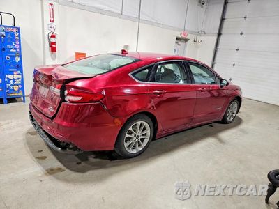 Trzecie zdjęcie samochodu z tyłu: 2019 FORD FUSION SE VIN:3FA6P0LU9KR188532 - miniatura