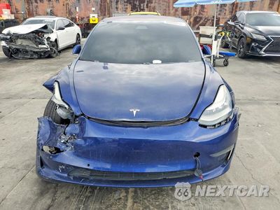 Piąte zdjęcie samochodu w środku: 2018 TESLA MODEL 3 VIN:5YJ3E1EB5JF117560 - miniatura