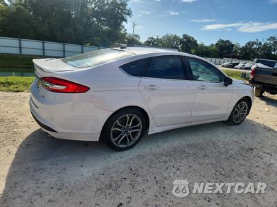 Trzecie zdjęcie samochodu z tyłu: 2017 FORD FUSION SE HYBRID VIN:3FA6P0LU2HR393179 - miniatura