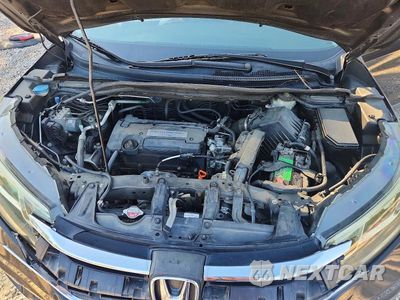 Zdjęcie 12 z 14 samochodu: 2015 HONDA CR-V EXL VIN:2HKRM3H77FH512929 - miniatura