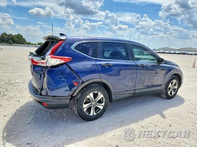 Trzecie zdjęcie samochodu z tyłu: 2018 HONDA CR-V LX VIN:2HKRW5H36JH410940 - miniatura