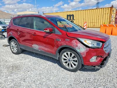 Czwarte zdjęcie samochodu z boku: 2017 FORD ESCAPE TITANIUM VIN:1FMCU0JD9HUC51120 - miniatura