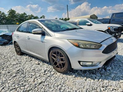 Czwarte zdjęcie samochodu z boku: 2016 FORD FOCUS SE VIN:1FADP3FE9GL368094 - miniatura