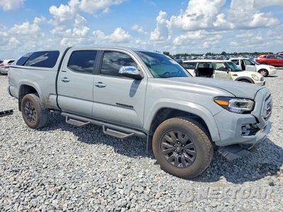 Czwarte zdjęcie samochodu z boku: 2021 TOYOTA TACOMA LIMITED VIN:3TMHZ5BNXMM102634 - miniatura