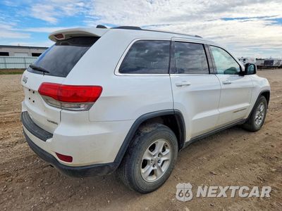Trzecie zdjęcie samochodu z tyłu: 2014 JEEP GRAND CHEROKEE LAREDO VIN:1C4RJFAG7EC204836 - miniatura