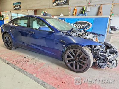 Czwarte zdjęcie samochodu z boku: 2022 TESLA MODEL S VIN:5YJSA1E59NF467460 - miniatura
