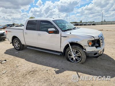 Czwarte zdjęcie samochodu z boku: 2014 FORD F150 SUPERCREW VIN:1FTFW1ET8EKF19990 - miniatura