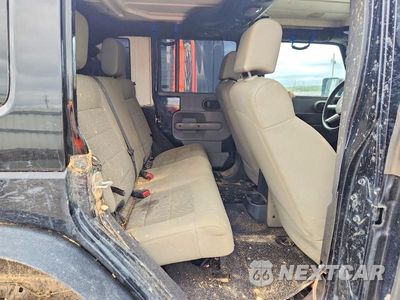 Zdjęcie 10 z 13 samochodu: 2008 JEEP WRANGLER UNLIMITED SAHARA VIN:1J4GA59118L534309 - miniatura