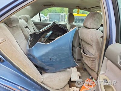 Zdjęcie 10 z 12 samochodu: 2004 TOYOTA CAMRY LE VIN:4T1BE32K04U927312 - miniatura