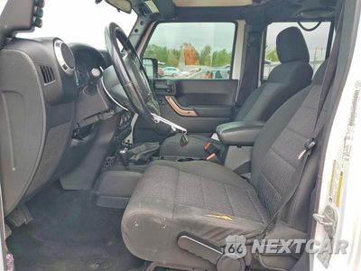 Zdjęcie 7 z 13 samochodu: 2011 JEEP WRANGLER UNLIMITED SAHARA VIN:1J4BA5H16BL604356 - miniatura