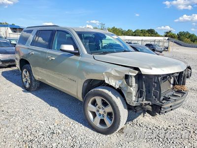 Czwarte zdjęcie samochodu z boku: 2016 CHEVROLET TAHOE C1500 LT VIN:1GNSCBKC6GR448632 - miniatura