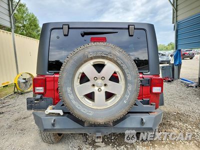 Zdjęcie 6 z 13 samochodu: 2012 JEEP WRANGLER UNLIMITED SAHARA VIN:1C4BJWEG7CL123554 - miniatura