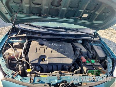 Zdjęcie 11 z 12 samochodu: 2010 TOYOTA COROLLA LE VIN:JTDBU4EE0A9119365 - miniatura