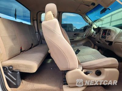 Zdjęcie 10 z 12 samochodu: 2003 FORD F150 VIN:1FTRX17W53NB70851 - miniatura