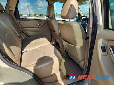 Zdjęcie 11 z 14 samochodu: 2005 MAZDA TRIBUTE S VIN:4F2YZ06155KM41529 - miniatura