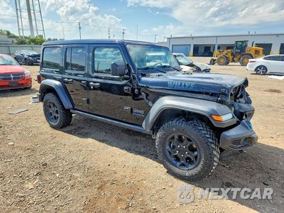 Czwarte zdjęcie samochodu z boku: 2023 JEEP WRANGLER 4XE VIN:1C4JJXN69PW610834 - miniatura