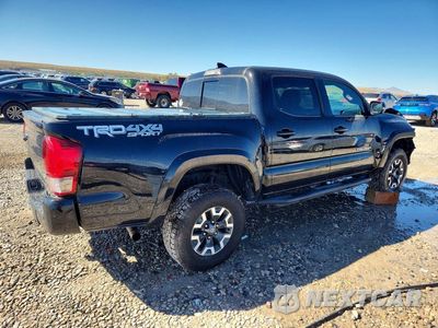 Trzecie zdjęcie samochodu z tyłu: 2017 TOYOTA TACOMA TRD SPORT VIN:3TMCZ5AN6HM054549 - miniatura