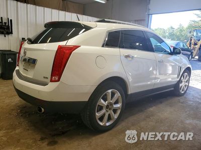 Trzecie zdjęcie samochodu z tyłu: 2014 CADILLAC SRX PERFORMANCE COLLECTION VIN:3GYFNFE35ES687732 - miniatura