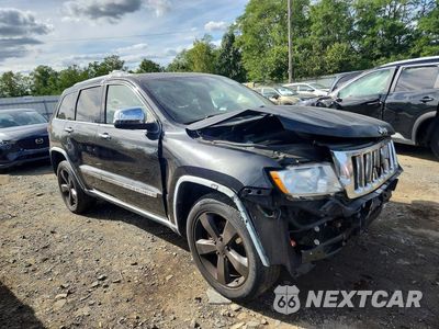 Czwarte zdjęcie samochodu z boku: 2012 JEEP GRAND CHEROKEE LAREDO VIN:1C4RJFAT6CC192320 - miniatura