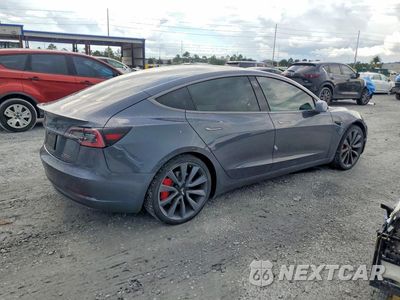 Trzecie zdjęcie samochodu z tyłu: 2019 TESLA MODEL 3 VIN:5YJ3E1EB2KF447691 - miniatura
