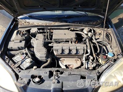 Zdjęcie 11 z 12 samochodu: 2002 HONDA CIVIC LX VIN:1HGEM21582L012321 - miniatura