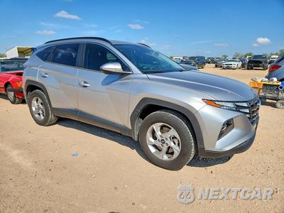 Czwarte zdjęcie samochodu z boku: 2022 HYUNDAI TUCSON SEL VIN:5NMJBCAE1NH040993 - miniatura