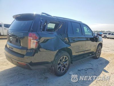 Trzecie zdjęcie samochodu z tyłu: 2021 CHEVROLET TAHOE K1500 Z71 VIN:1GNSKPKD7MR126991 - miniatura